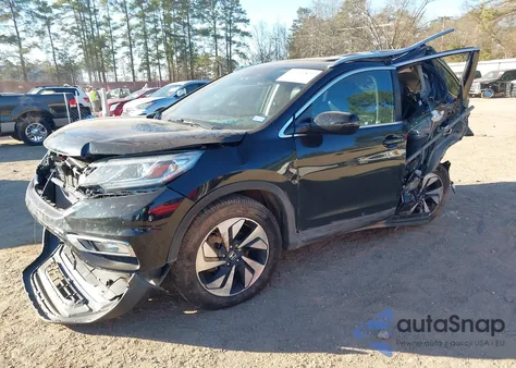2016 Honda Cr-V Touring z USA, uszkodzony, nr VIN 5J6RM4H98GL046510